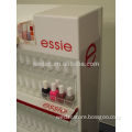 Display stand with acrylic shelf pusher for nail polish retail